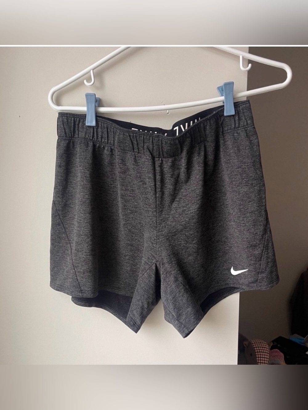 Nike Gray Athletic Shorts with White Swoosh